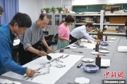 梦见捉蛇两岸艺术家在安徽“共绘一幅画”